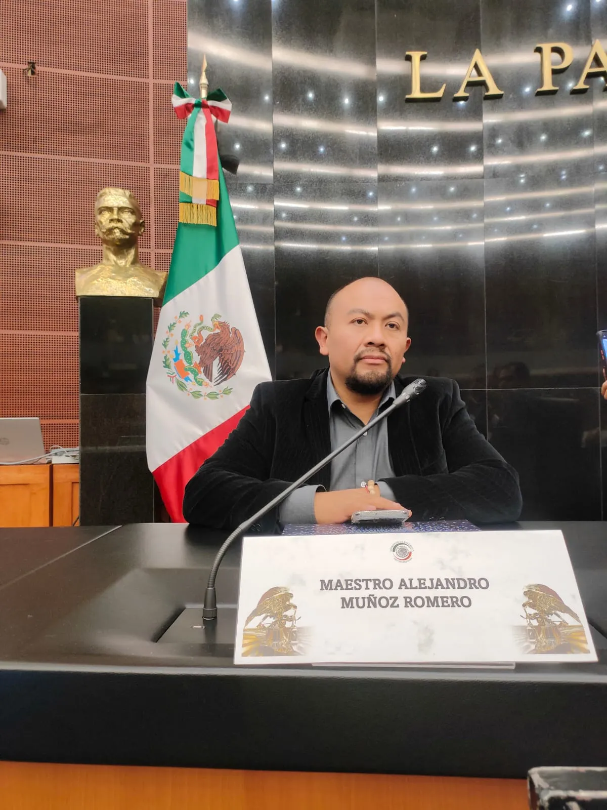 Speaker at a Senate podium